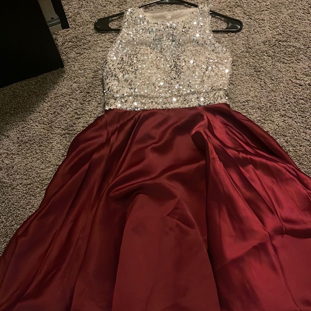It’s a new with tag wine color any event dress